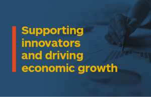 Coloured block with text. Text reads: Supporting innovators and driving economic growth